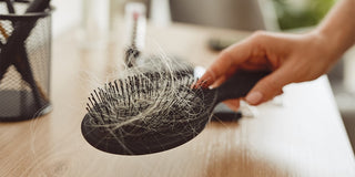 Hair shedding in brush as a result of Covid hair loss